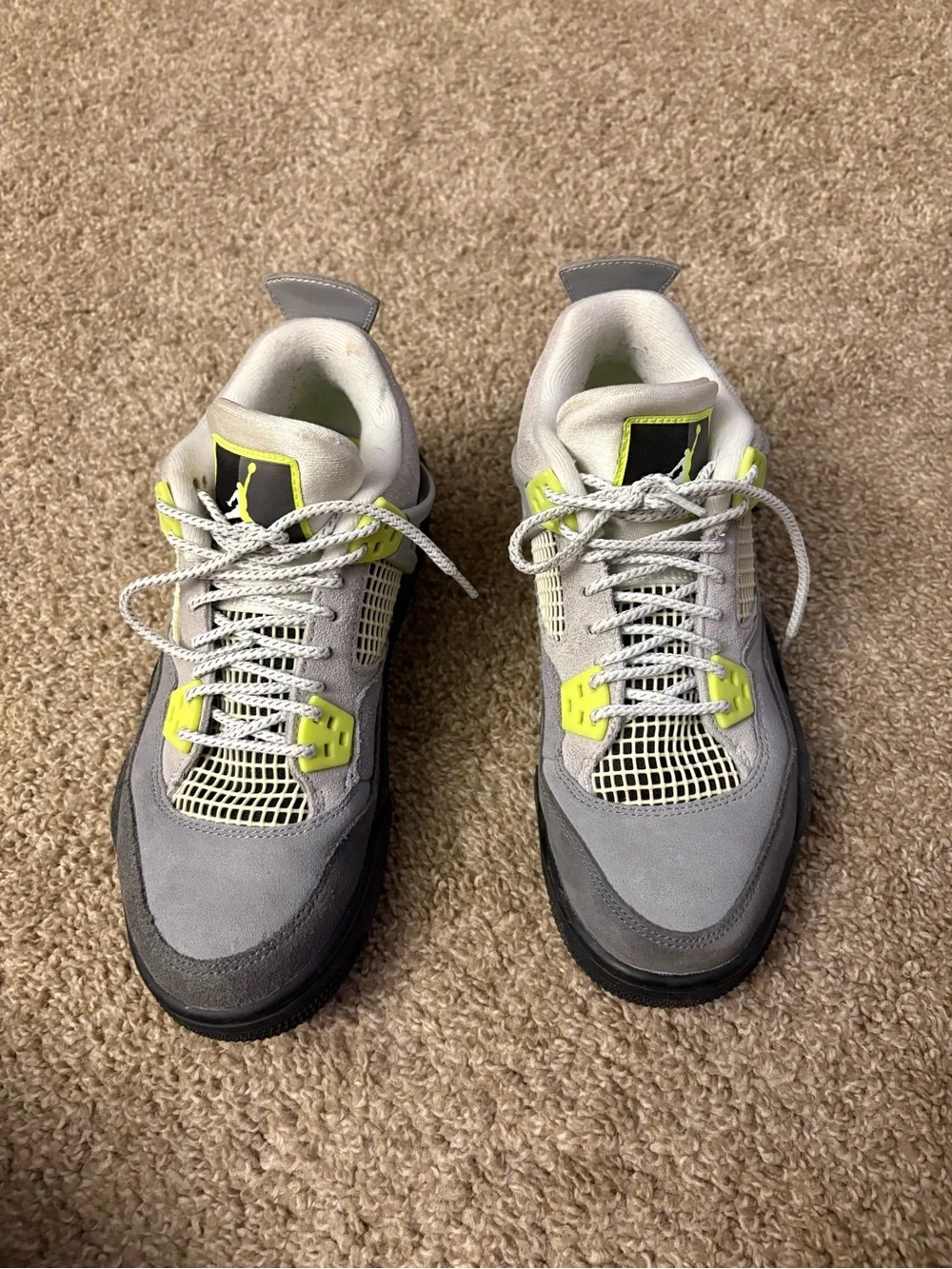 Retro 4 grey and neon green Jordan’s